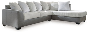 You want your living room to reflect your ultra-cool character. Introducing: this sectional with chaise. Its combination of retro-cool jumbo cord and sleek faux leather takes a unique approach to contemporary aesthetics. For a finishing touch, pillows pro
