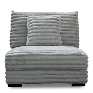 The Embrace Armless Chair with 1 Accent Pillow in gray offers a perfect blend of comfort and style, enhancing any living space. Upholstered in 100% gray polyester fabric with a fluffy, blanket-like texture, this chair is designed for ultimate relaxation. 