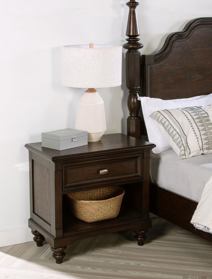 This nightstand combines classic design with modern functionality, making it a perfect addition to any traditional bedroom. The dark oak finish enhances the intricate wood grain, while the single drawer offers convenient storage for bedside essentials. An