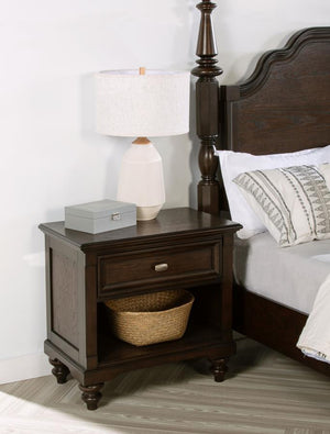  making it a perfect addition to any traditional bedroom. The dark oak finish enhances the intricate wood grain