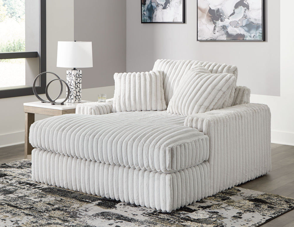 Donâ€™t want to sacrifice standout style for majorly cozy seating? This set pairs bold character with sink-in comfort. Its retro-cool jumbo cord over feather-blend cushions creates a luxuriously soft lounging experience. With this sectional and chaise, yo