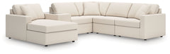 Looking cool and contemporary is great. But when it comes down to it, youâ€™re all about low-maintenance lounging. With the performance fabric on this sectional with console, cleaning spills is a breeze. Its customizable modular design caters to your ever
