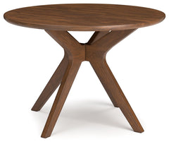 A refreshed take on retro aesthetics. This dining table adds an air of playful simplicity to your dining space, capturing the architectural language of mid-century stylings. Sleek on top, it invites the eye with a dynamic base. A casual, yet timeless, fin