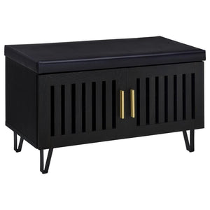 This modern storage bench combines style and functionality, featuring a faux leather upholstered padded top for added versatility as a seating bench. The cabinetâ€™s two doors showcase a vertical slat design, enhancing its contemporary aesthetic while all