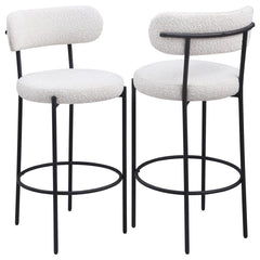 Refresh your kitchen island or elevated bar table with a set of two modern barstools. Each features foam cushions and contemporary boucle upholstery in a neutral hue. Black finish metal framing provides excellent support and durability, while slim legs an