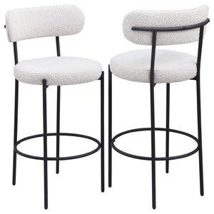 Refresh your kitchen island or elevated bar table with a set of two modern barstools. Each features foam cushions and contemporary boucle upholstery in a neutral hue. Black finish metal framing provides excellent support and durability, while slim legs an
