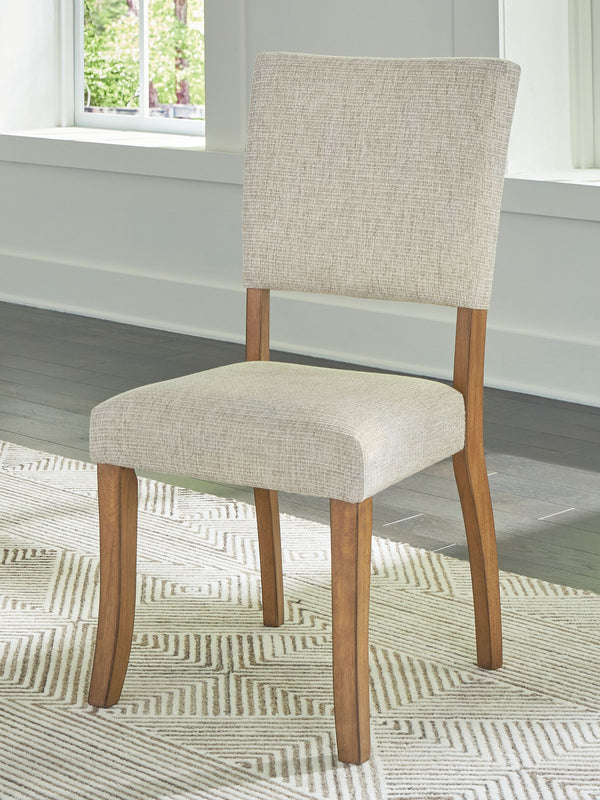  the frame is finished in an inviting light wood tone. For added flair and function