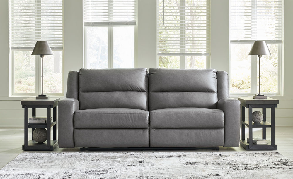 This reclining sofa and loveseat with matching recliner set appeals to your love for feature-filled furniture, all while maintaining a clean-lined and contemporary design. Pop-out storage and cup holders keep essentials close when you need them and tuck a