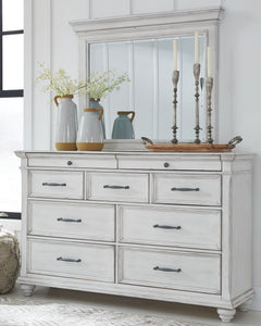 Give your retreat vintage charm and valuable drawer storage with this dresser and mirror set. In a beautifully distressed whitewash finish, you-'ll love putting it all away in casual style. Seven full-sized drawers and two accessory top drawers will easil