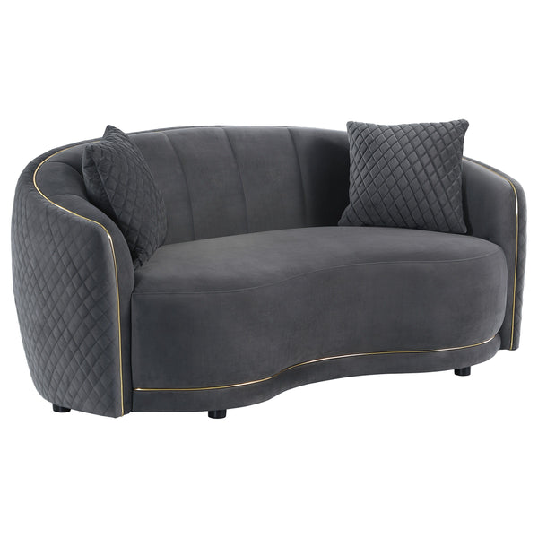 Bold contrast is achieved with the sophisticated gold trim featured on a modern loveseat. Designed to make a statement, the loveseat is a chic curved kidney silhouette with tight upholstery over its seat and a channel tufted back. The outer back and arm s