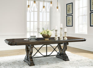  this dining extension table makes a bold statement. With a shapely tabletop that sits upon a double pedestal base