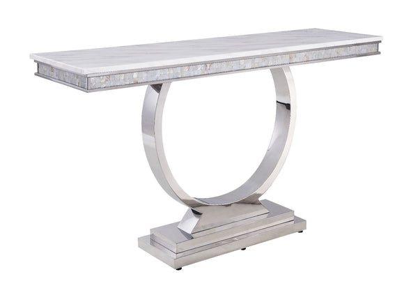 This beautiful contemporary work places a strong emphasis on lustrous materials that make a bold statement of personality and style. Shiny metal frame and white marble top complement each other perfectly, making the table more visually appealing. The Zand