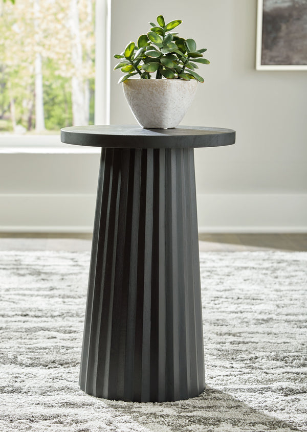  the solid wood piece wows with a fluted base. This organic beauty can be used on its own or grouped with other pieces in the collection. Howâ€