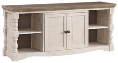 Set your sights on modern farmhouse style with this XL TV stand. Distressed two-tone treatment blends a weathered gray with vintage white for an utterly charming effect. Turned posts lend a hearty, substantial look that feels right at home, while plenty o