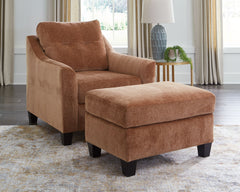 Urban contemporary meets mid century (with a pop of trend-right color) in this set. Supremely soft upholstery, teeming with luster and movement, finesses the piece with just the right touch. Can you think of a better spot to entertain friends or spread ou