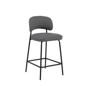 The Blythe Gray Faux Leather Counter Chair set combines modern design with practical comfort, perfect for enhancing any contemporary space. Each set includes two counter-height chairs with a sleek, arched back and low profile for a refined look. The gray 