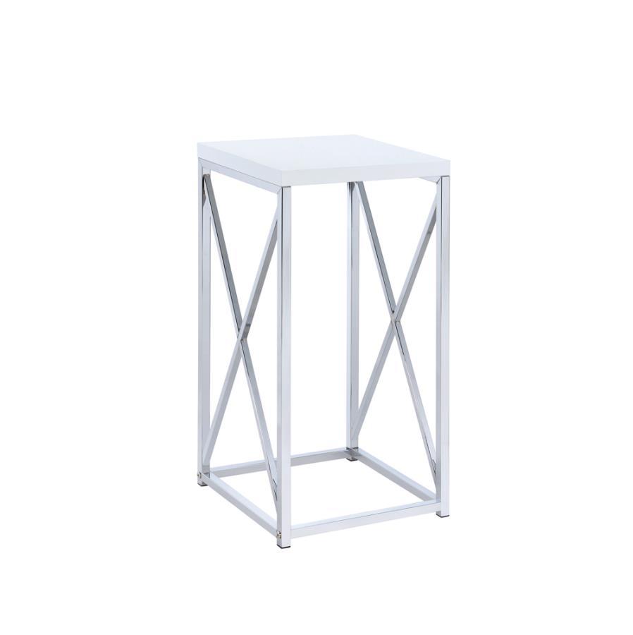 This the modern accent table oozes luxury and offers a sophisticated update to a simple silhouette. Decorated with X-shape details, the base is constructed of sleek lines in a bright, metallic finish. Dress up any living or sitting area with the crisp and