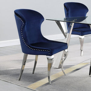  while the individually hand-driven nailhead trim adds a luxurious touch. Wrapped in soft velvet upholstery