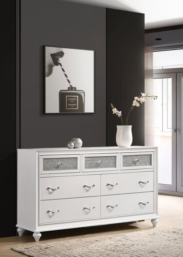  this modern dresser really stands out. The top drawer fronts are covered in sparkling acrylic panels for a stunning infusion of shine. Faceted crystal hardware takes elegance to the next level. Dainty turned feet add a classic elem