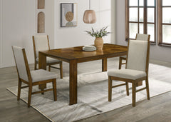 Transform your dining space into a haven of warmth and style with this stunning ensemble, perfect for both casual and formal settings. The tailored chairs and tufted bench are upholstered in a soft neutral fabric, providing luxurious comfort and a modern 