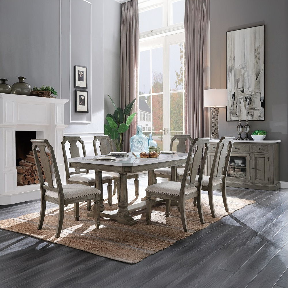 Serving a practical purpose while maintaining a classic design, the server features a gracefully carved wooden base in a weathered oak finish for rich textures and vintage beauty. White artificial marble top provides a clean and perfect counter space that