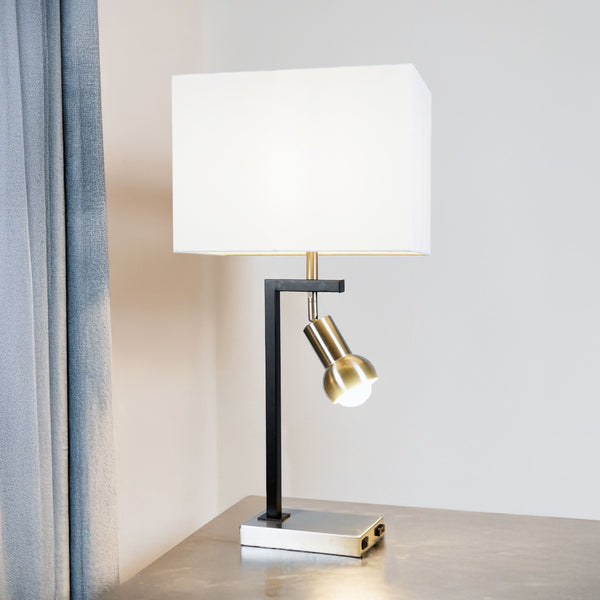 Illuminate your space with a sleek and contemporary design that perfectly blends form and function. This table lamp features a bold geometric frame in a matte black finish, contrasted beautifully by a brushed metallic accent for a touch of modern elegance