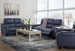 This power reclining sofa with matching loveseat and recliner set puts a sleek twist on laid-back living. It satisfies your desire for comfort without being bulky in design, thanks to subtly incorporated one-touch reclining and adjustable headrests. With 