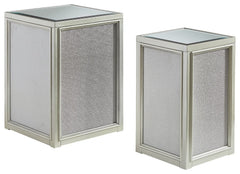Reminiscent of Hollywood glamour of yesteryear, this set of nesting end tables interprets luxury in a decidedly modern way. A dazzling metallic silvertone finish and textured laminate panels for added luster enhance the star power, while the beveled inset