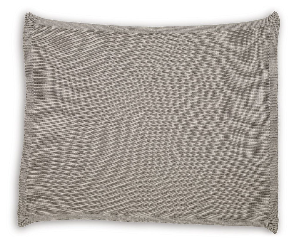 Your place is that much more relaxed and inviting with this cozy throw. Crafted with supreme softness in mind, its neutral hue pairs with a variety of decor. Whether this throw is at the foot of the bed or on the arm of your favorite chair, it-'s wonderfu
