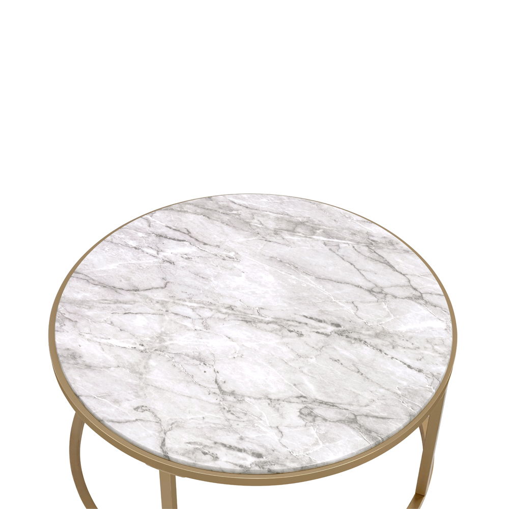 Entertain in style with the Shanish Coffee Table Set. This distinctive two-piece occasional table set showcases intertwining tables with a gold finished metal base that nestles together or can separate for additional entertainment and display space. This 