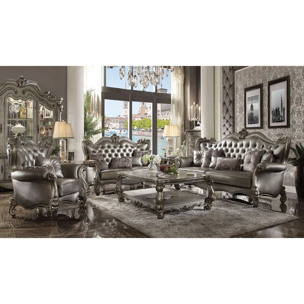 The Versailles collection with antique platinum finish will create you an elegant, warm and traditional taste in your living room. The sofa set reflects highly decorative base with scrolled feet, and the upholstered seats with the deep button tufted and N