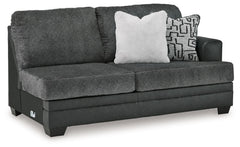 This right-arm facing sofa is made with polyester and faux leather upholstery. Pairs with other items in the series to make a sectional.<br><br><b>Additional Dimensions</b><br><ul><li>Arm height: 27-"</li><li>Seat depth: 23-"</li><li>Seat height: 21-"</li