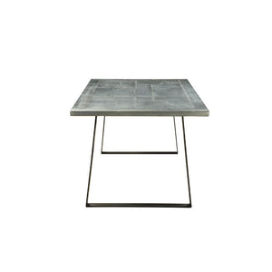  the Kaylia dining table combines durable steel construction in aluminum and iron metal. The table features a unique metal sled base and aluminum top paired with padded top grain leather side chairs in 2 choices of
