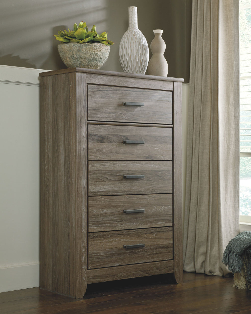 If effortless elegance is the impression youâ€™re going for, this chest of drawers is custom made to fit your space. Itâ€™s got the crisp, clean lines of a contemporary piece, but with softly weathered elements, including antiqued industrial pulls and an 