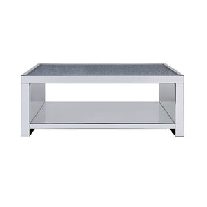  this brilliant rectangular occasional table showcases a distinctive style for an intriguing look. The table features a fully mirrored beveled frame and t