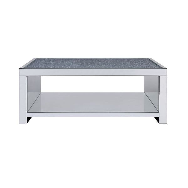  this brilliant rectangular occasional table showcases a distinctive style for an intriguing look. The table features a fully mirrored beveled frame and t