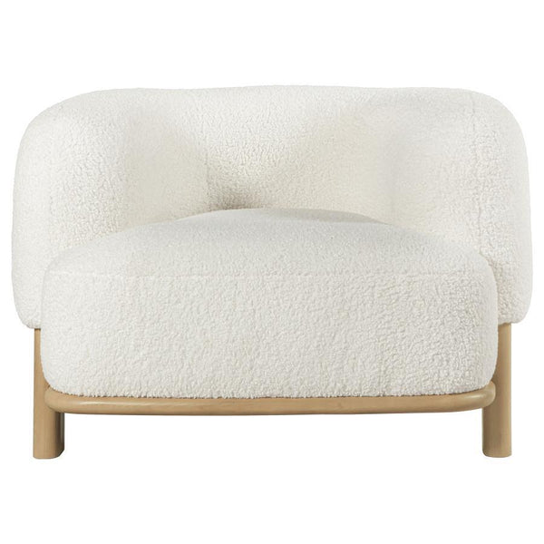  enduring lines that create a welcoming ambiance. Heavily textured upholstery adds neutral allure