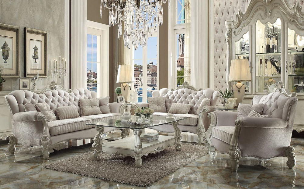 The Versailles collection with bone white finish will create you an elegant, warm and traditional taste in your living room. The sofa set reflects highly decorative base with scrolled feet, and the upholstered seats with the deep button tufted and Nailhea