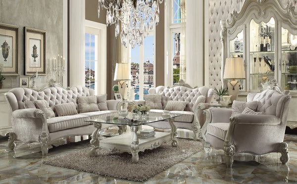 The Versailles collection with bone white finish will create you an elegant, warm and traditional taste in your living room. The sofa set reflects highly decorative base with scrolled feet, and the upholstered seats with the deep button tufted and Nailhea