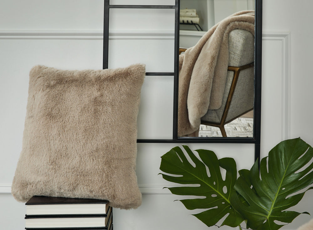 Soft, subtle and sensational. The plush feel of this faux rabbit fur pillow will drive you wild. Its taupe hue pairs with a variety of decor, from casual to contemporary.<br/><br/><b>Product Features</b><ul><li>Made of polyester</li><li>Soft polyfill</li>