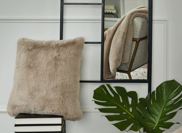  subtle and sensational. The plush feel of this faux rabbit fur pillow will drive you wild. Its taupe hue pairs with a variety of decor