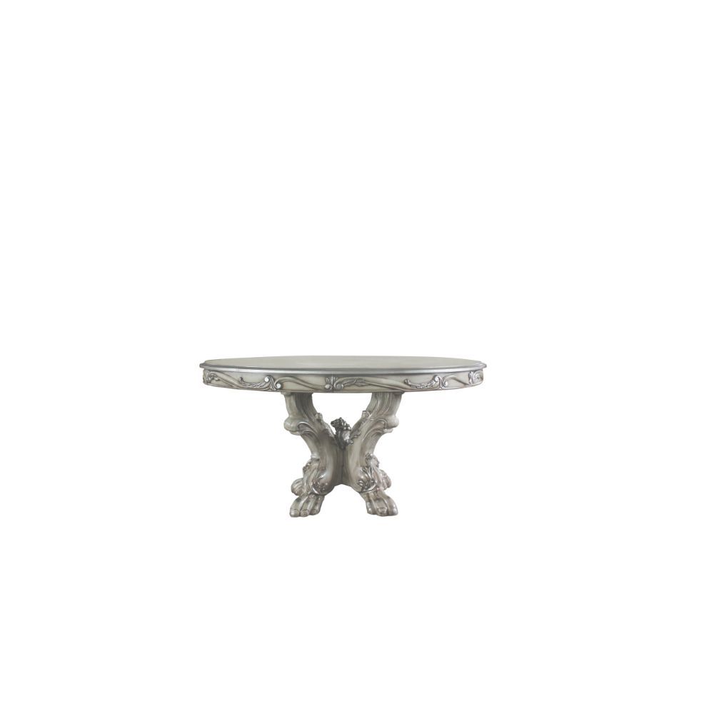 Acme is proud to present a new addition to our exclusive Dresden dining collection! This exquisite dining table in vintage bone white will look lovely in your home, with ornate carvings and raised floral motifs on its apron and pedestal base, which ends i