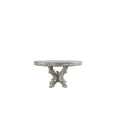 Acme is proud to present a new addition to our exclusive Dresden dining collection! This exquisite dining table in vintage bone white will look lovely in your home, with ornate carvings and raised floral motifs on its apron and pedestal base, which ends i