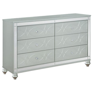 Give your home a modern glam update to classic design with this transitional six-drawer dresser. It features a glitzy design that takes center stage in any modern bedroom. It-'s fashioned with a vibrant silver metallic finish with fret work detail on the 