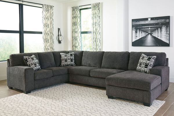 A mastery in less is more, this sectional manages to make cool, contemporary design so warm and cozy. A new twist on neutral, the sectionalâ€™s soothing -"smoky-" gray upholstery is incredibly plush to the touch. Gently rounded corners give the clean-line