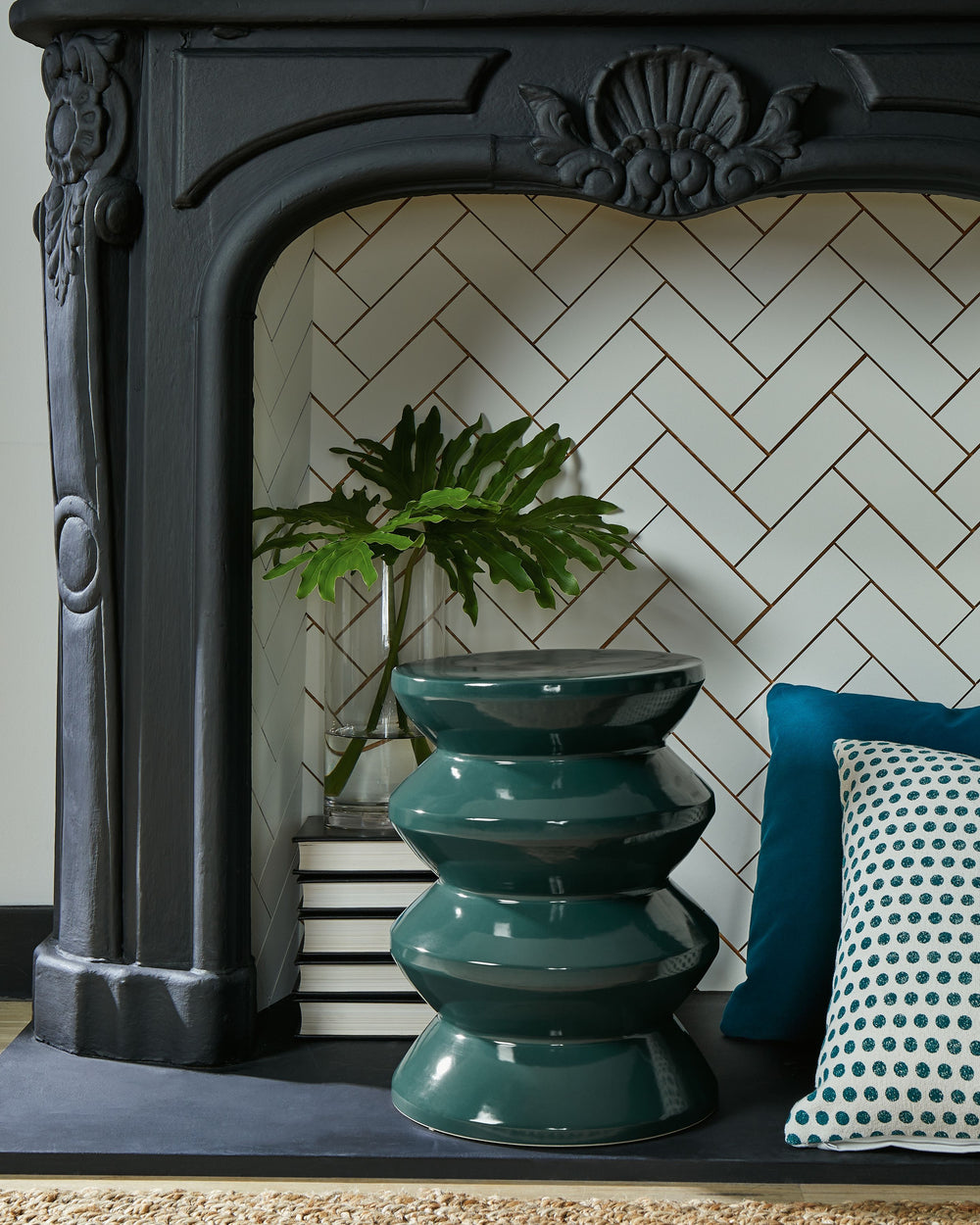Become enamored by the bold curves of this accent stool. A teal glaze gleams against the dynamically designed ceramic piece, supporting house plants, decor or your beverage of choice in simply stunning style. This versatile piece is indoor-outdoor safe.<b