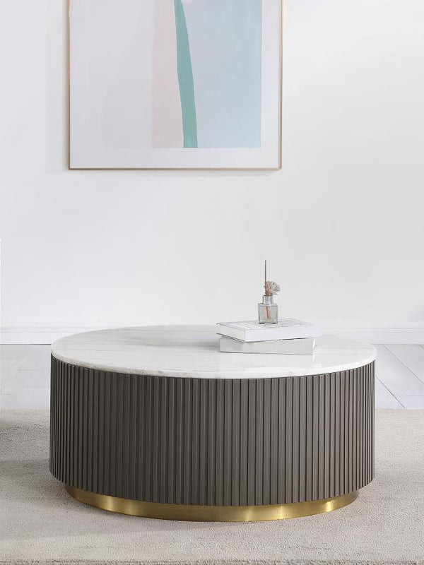  modern round coffee table. The genuine white marble top exudes sophistication with its subtle veining