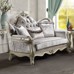 The Libertee collection sofa set is a blend of classic elegance and modern comfort. Finished in champagne, this set features a KD back, legs, and armrests with a wooden inner frame. The tight back and loose seat cushions, constructed with pocket coils, en