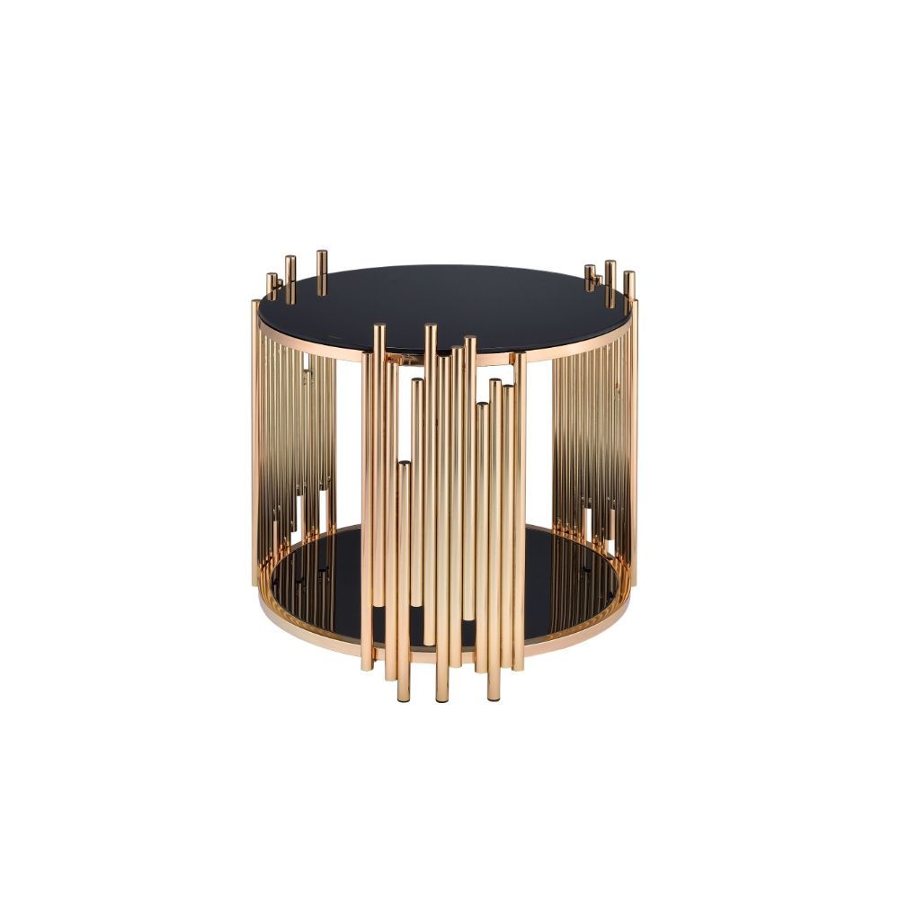 Add a fashion-forward touch of geometry to your living room with the asymmetrical metal tubing detail of the Tanquin black mirror end table. This contemporary piece sits on a circular metal drum base with a gold finish and lower shelf. Some Assembly Requi