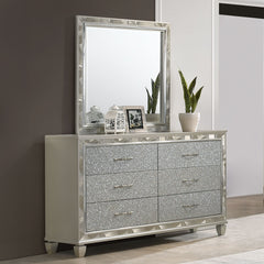 Experience sophistication and functionality with the Radiance Dresser & Mirror in Silver. Crafted with a blend of Solid Rubberwood and manufactured woods, this set ensures unmatched stability and durability. The semi-gloss lacquer Platinum Silver finish a